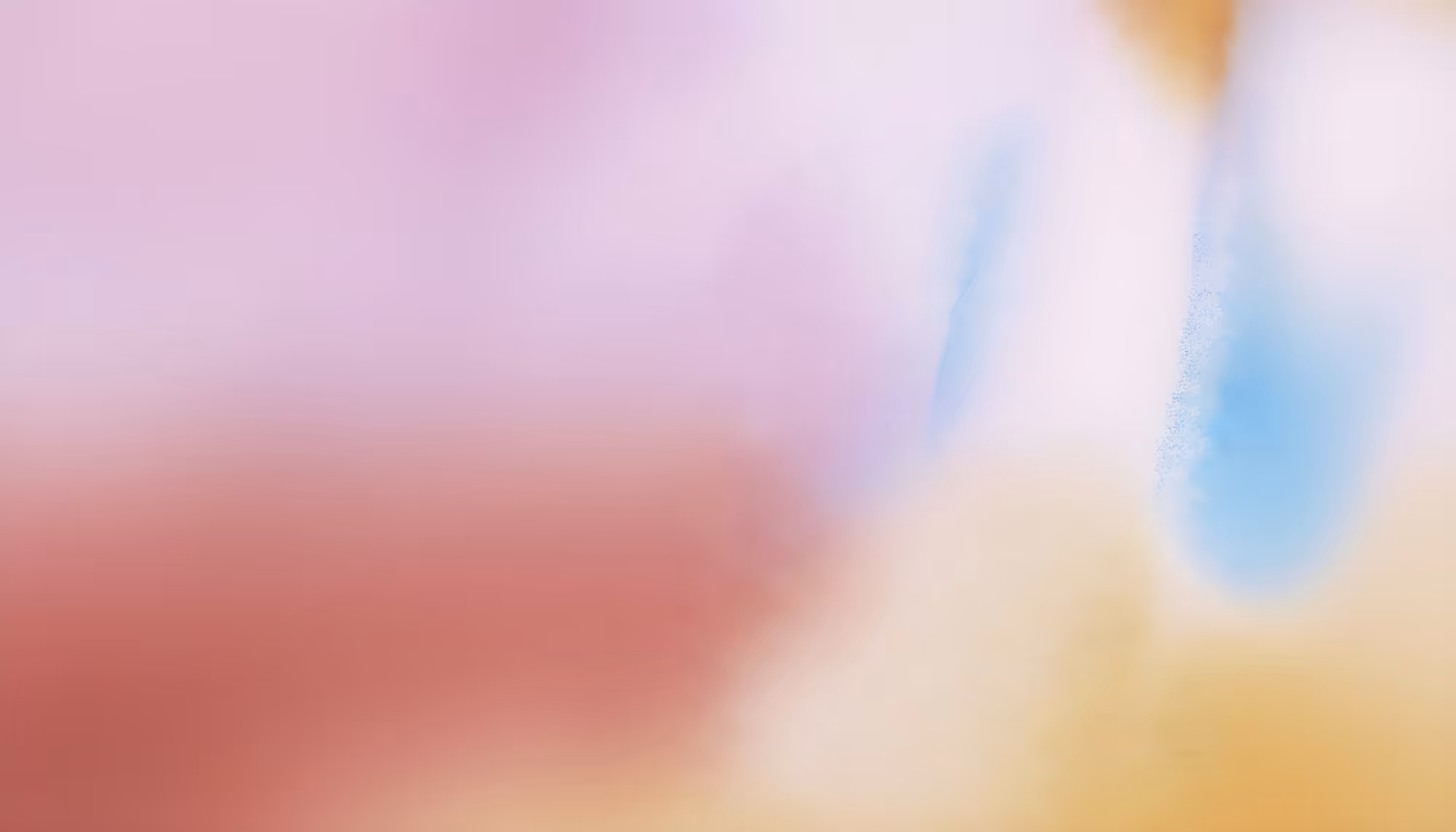 Abstract image with soft, blurred pastel colors: pink, blue, peach, and cream. The gentle blending creates a calming, serene atmosphere.