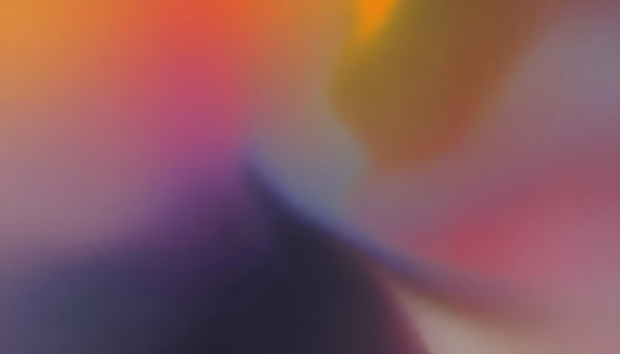 Abstract image with soft gradients of purple, pink, orange, and yellow blending smoothly. The overall tone is warm and calming, evoking a sense of tranquility.