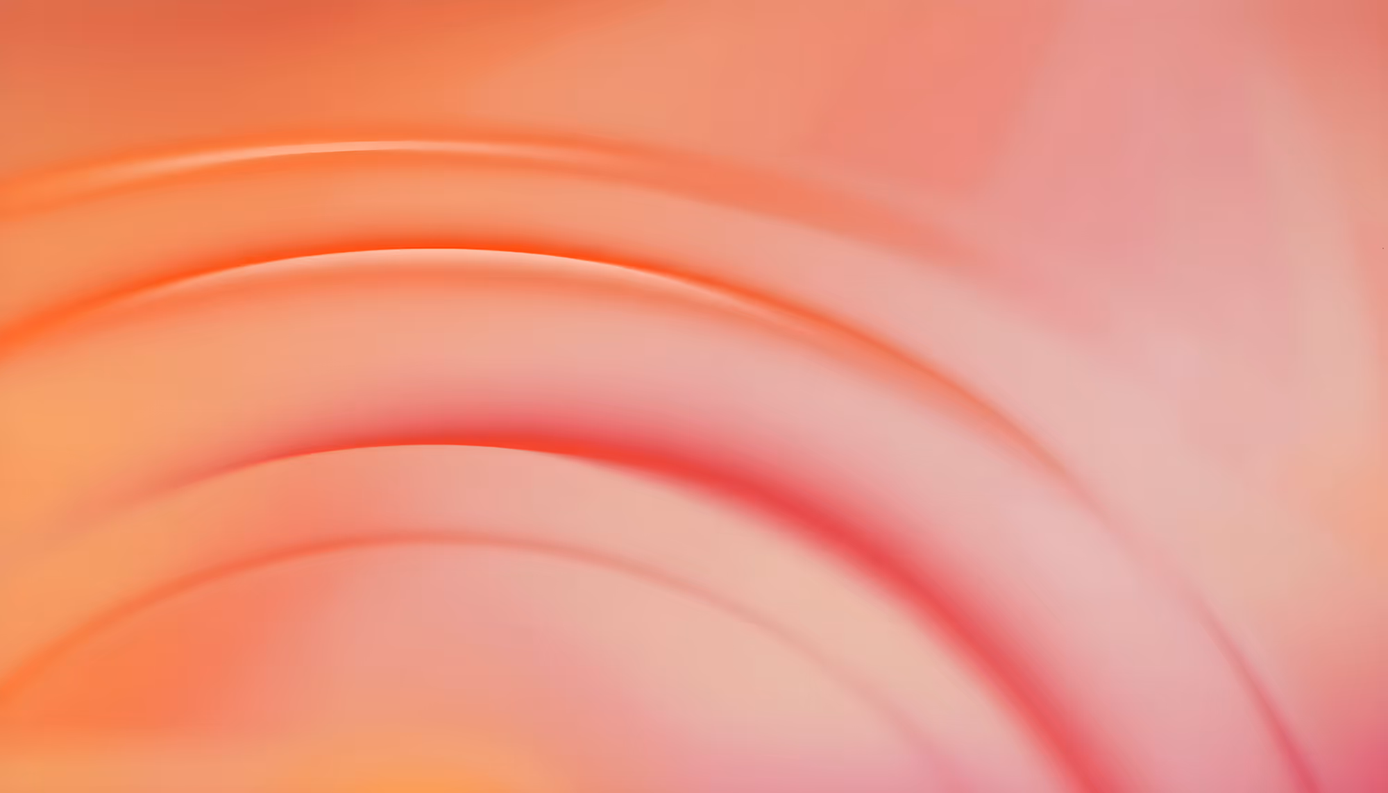 Abstract image with smooth, curving lines in warm hues of orange, pink, and red, creating a soothing, mellow and harmonious effect.