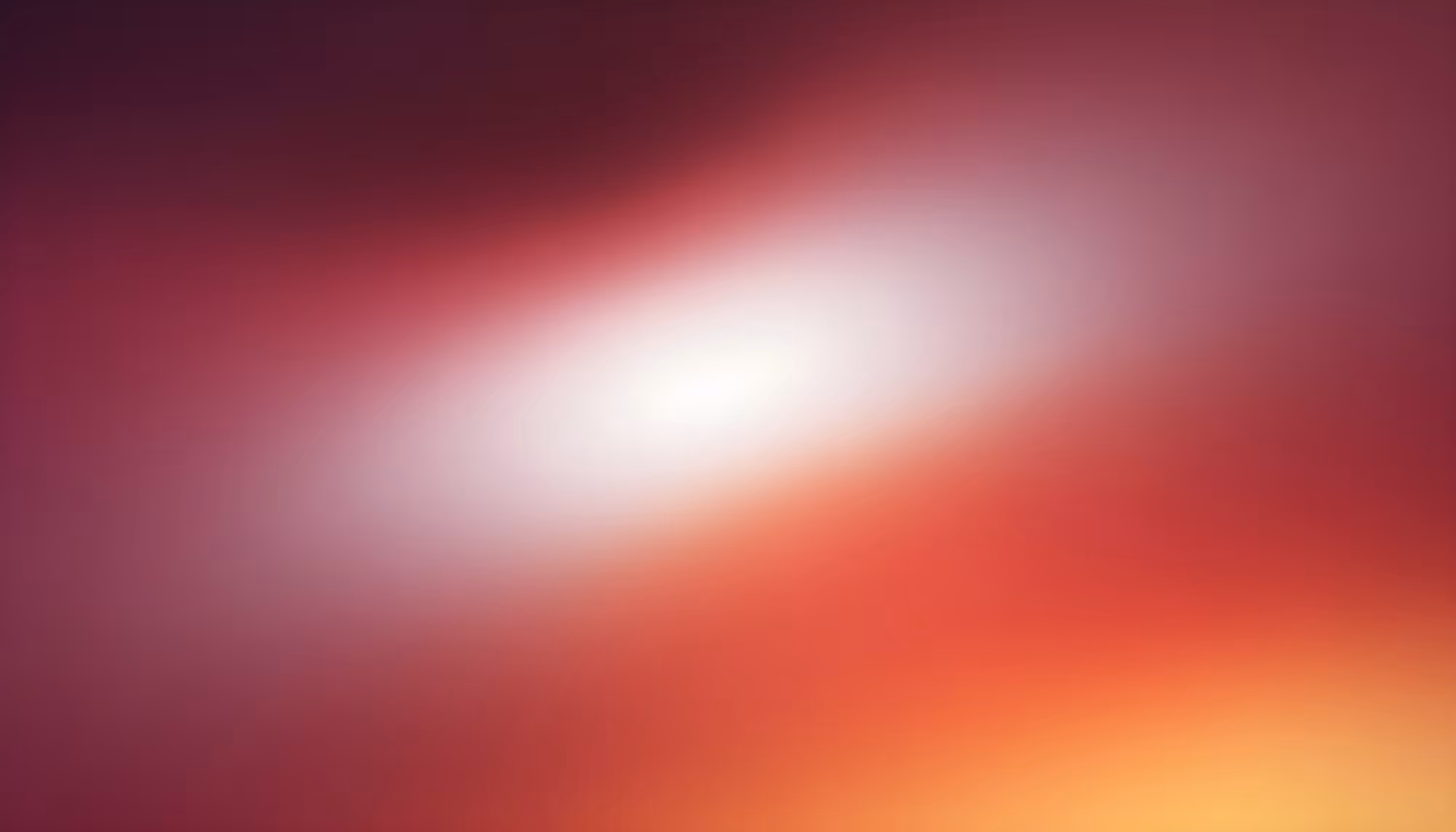 Abstract image with a soft gradient blending from deep red to warm orange, featuring a bright white blur at the center. The tone is calm and soothing.