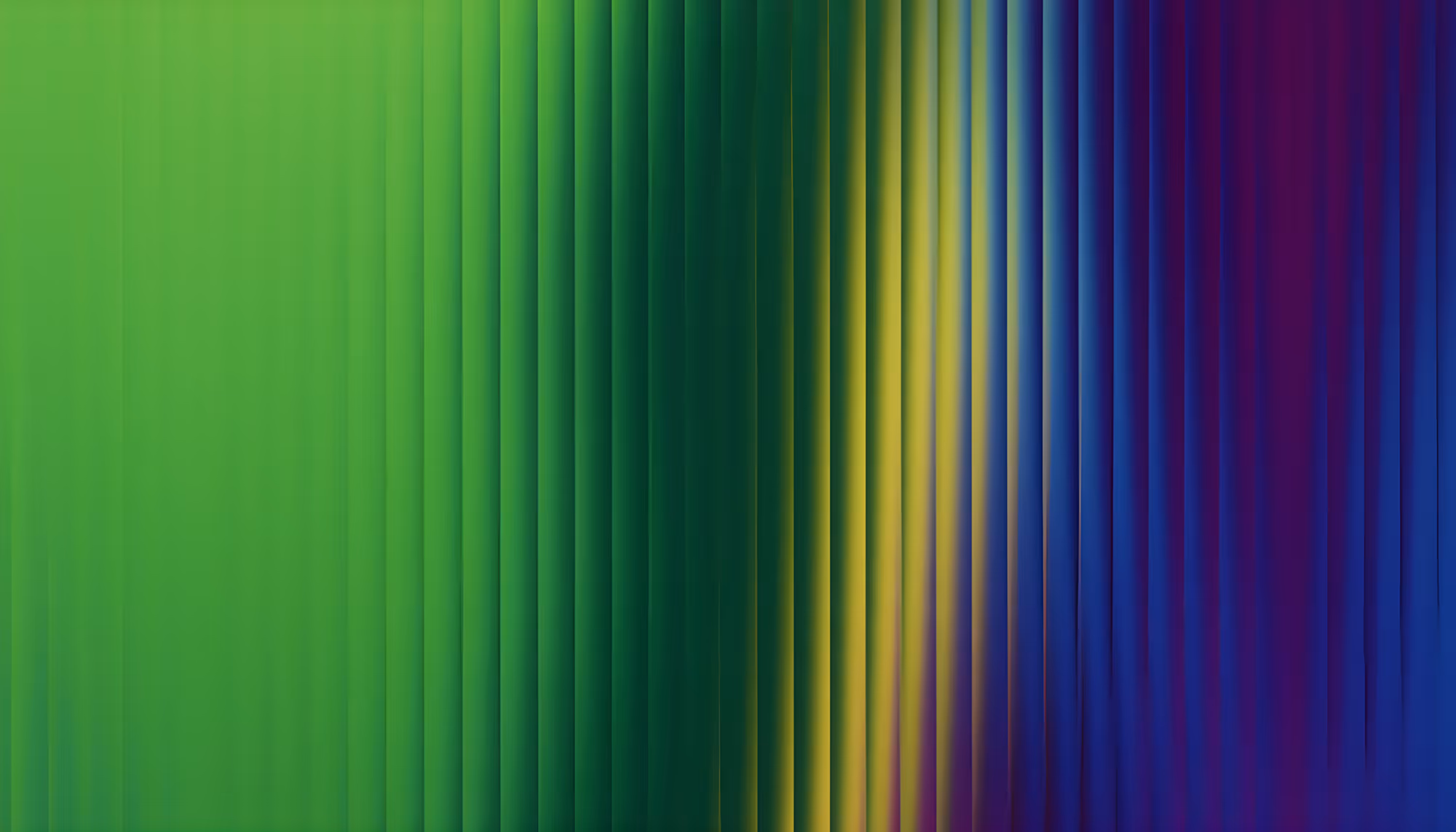 Abstract image of vertical lines blending green, blue, yellow, and purple shades, creating a vibrant, gradient effect that feels dynamic and fluid.