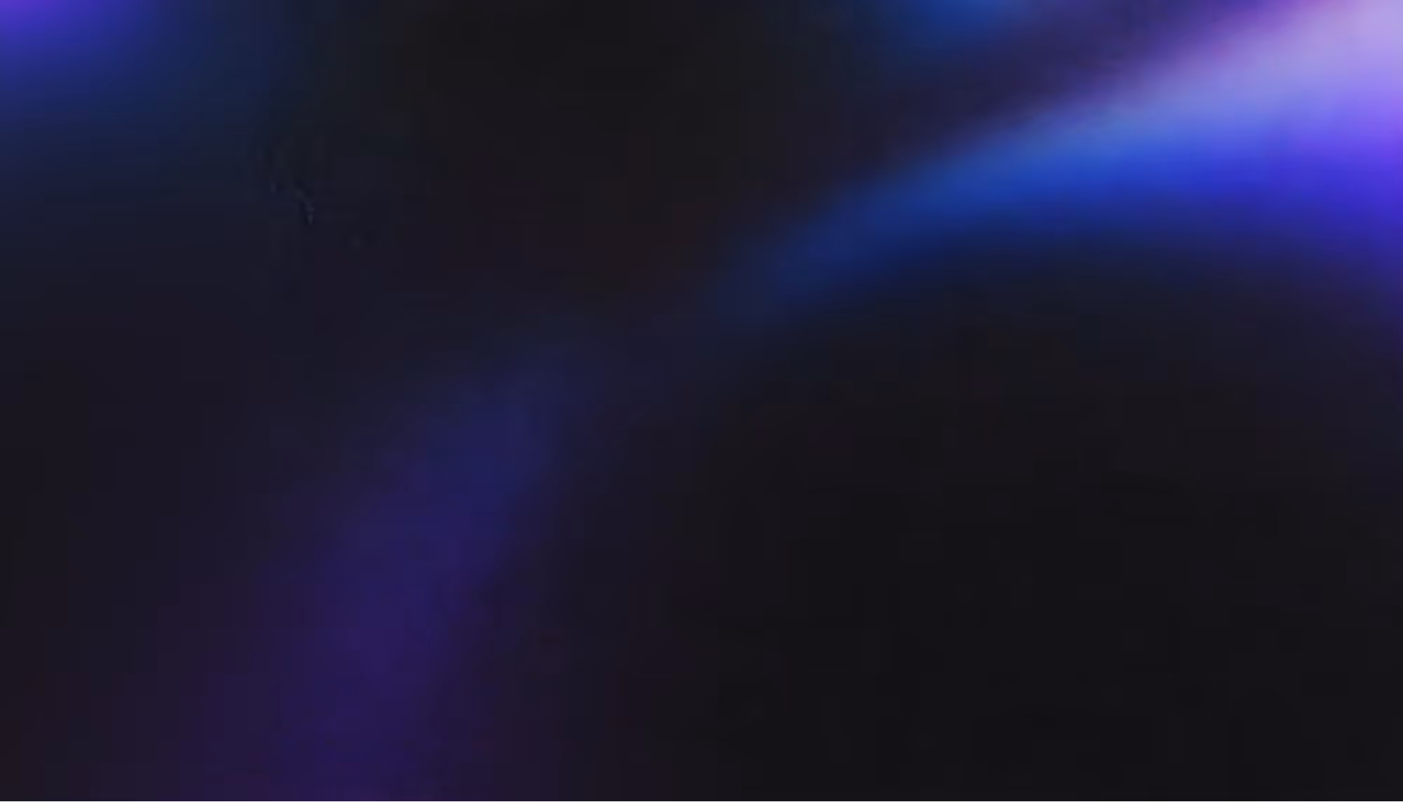 Abstract image featuring soft, wavy gradients of dark purple and blue on a black background, creating a mysterious and ethereal atmosphere.