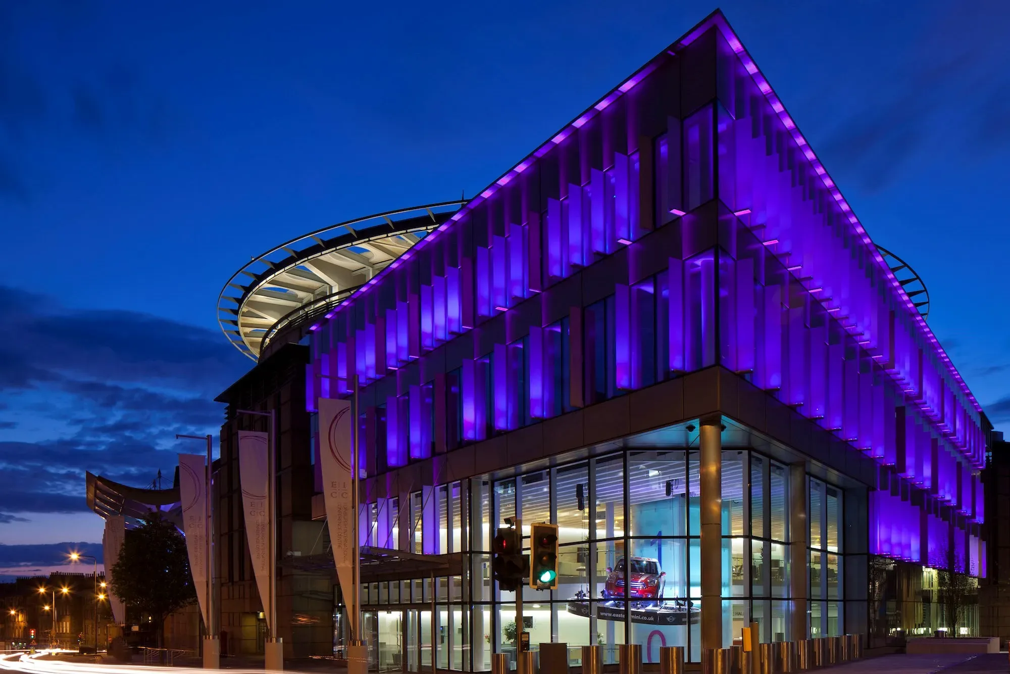 Edinburgh International Conference Centre exterior lit purple at night