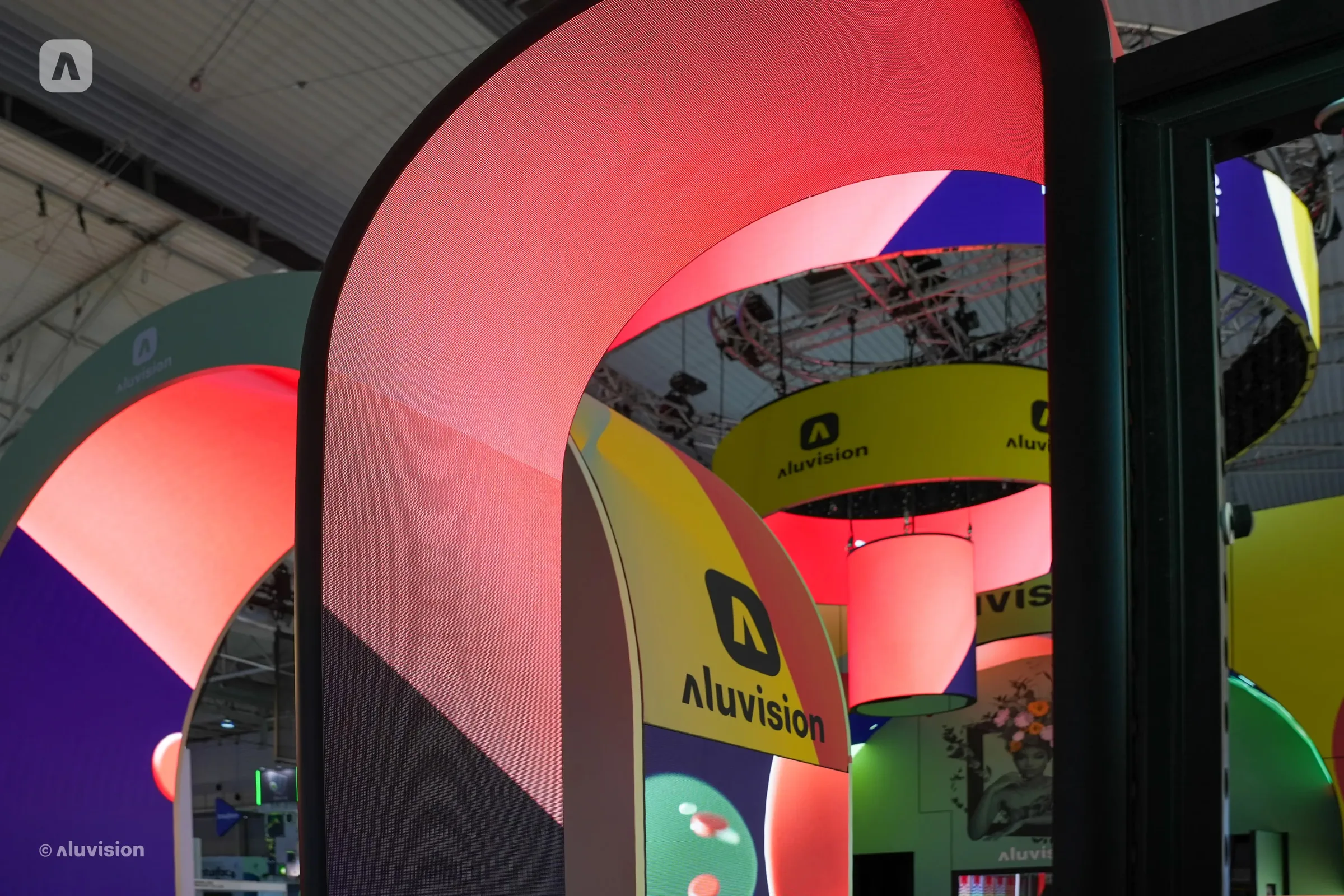 Aluvision backlit arches on an exhibition stand