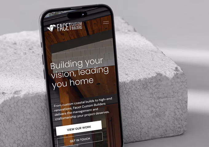 Facet Builders website shown on mobile device