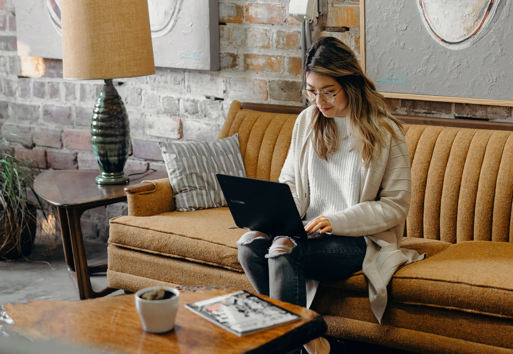Matt and Missy, co-founders of Greaterthan Studio, collaborating in a bright studio environment
