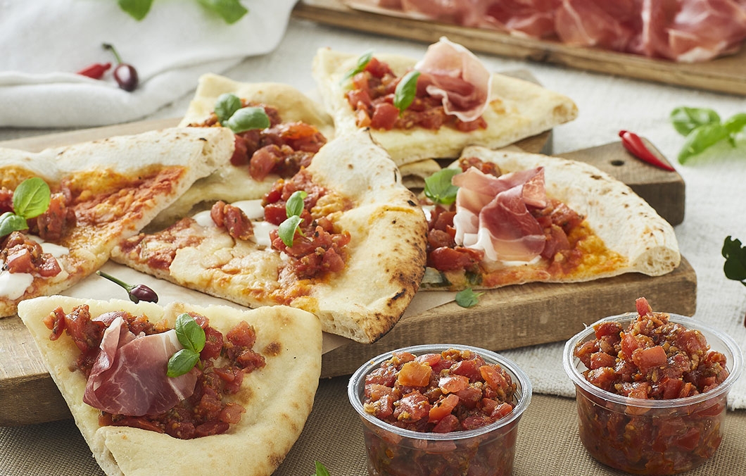 AperiTiamo con il Fiocco sulla Pizza: il gesto semplice che cambia il tuo aperitivo