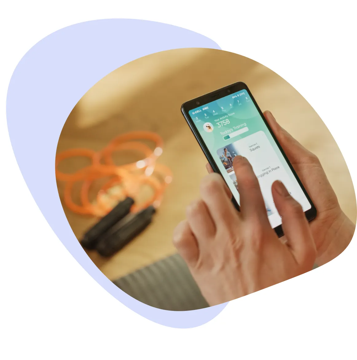 Someone tapping a fitness app on their phone