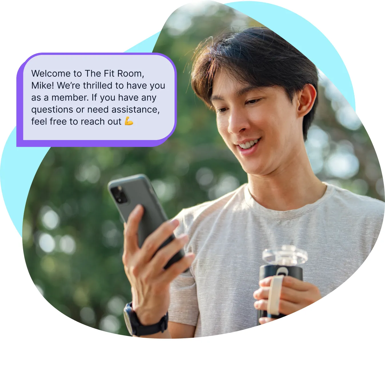 A gym member reading a welcome text from their trainer