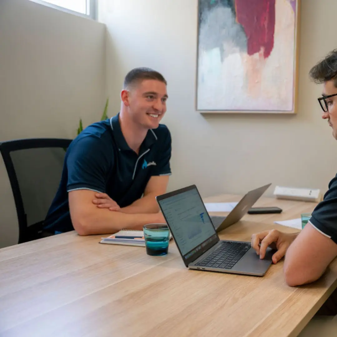 Enkindle Group founders working through a client account