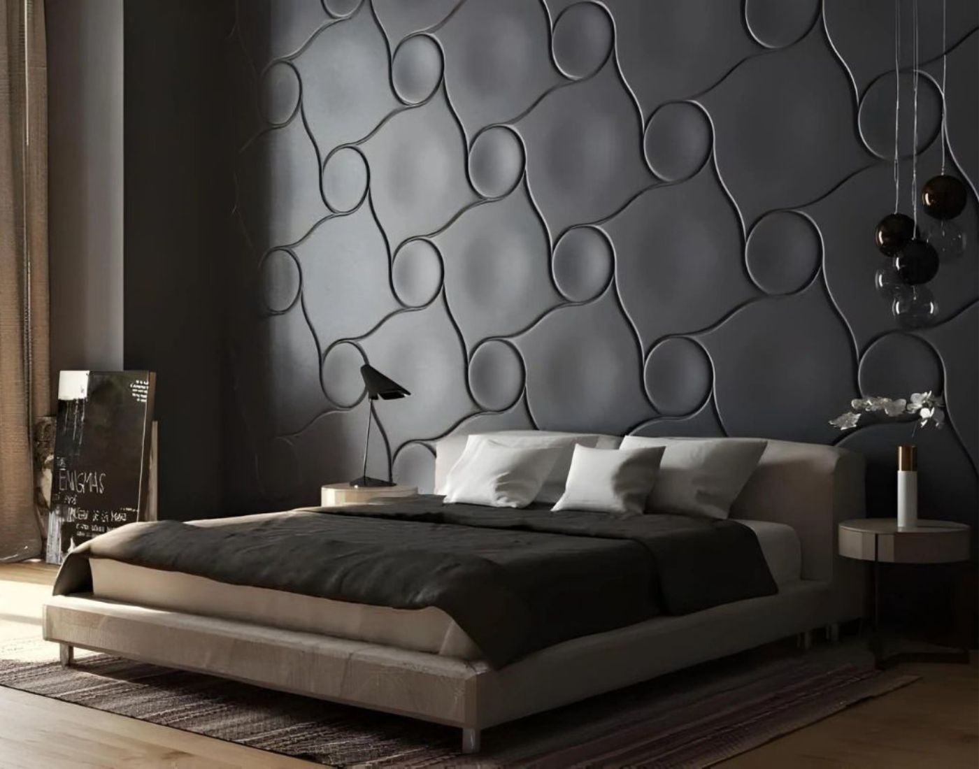 Modern bedroom with low bed, black bedding, white pillows, textured dark gray accent wall, and bedside tables.
