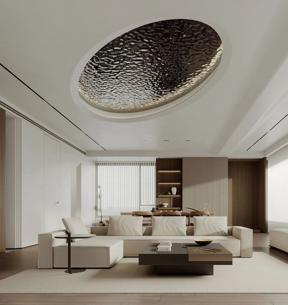 Modern living room with a large white sofa, black coffee table, and textured circular ceiling feature.