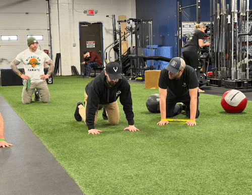 Patient working with a provider at a performance physical therapy clinic in Enfield, CT