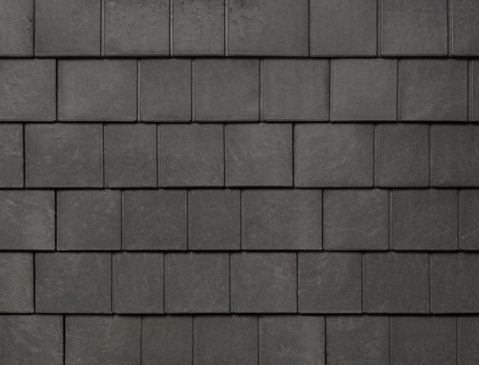 Close-up swatch of Silvered Cedar Enviroshingle, showcasing authentic perfection cedar shingle aesthetics and textural variation