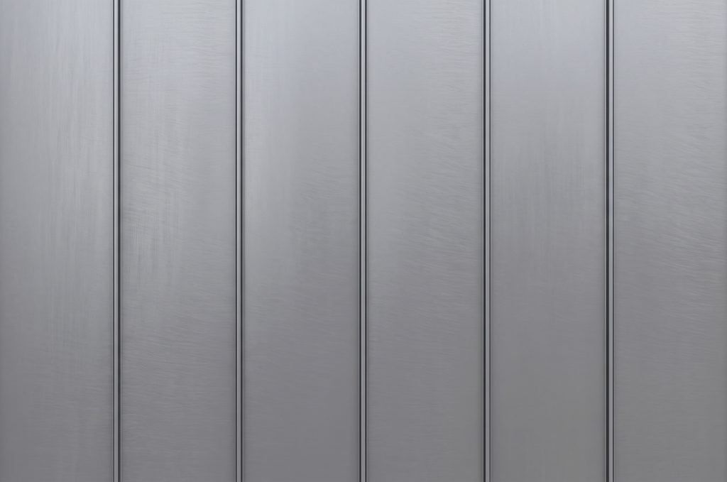 A material swatch showcasing grey standing seam metal