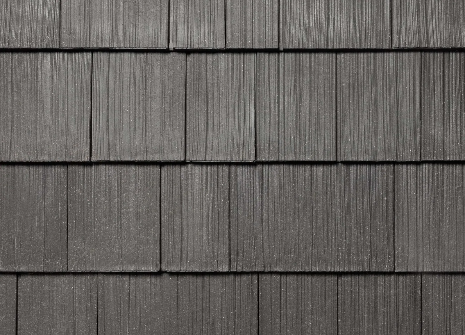 A swatch of silvered cedar Enviroshake, which closely mirrors the natural look of cedar shake