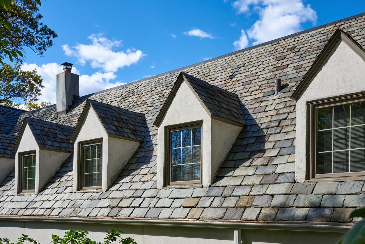 A traditional slate roofing system with multiple tones.