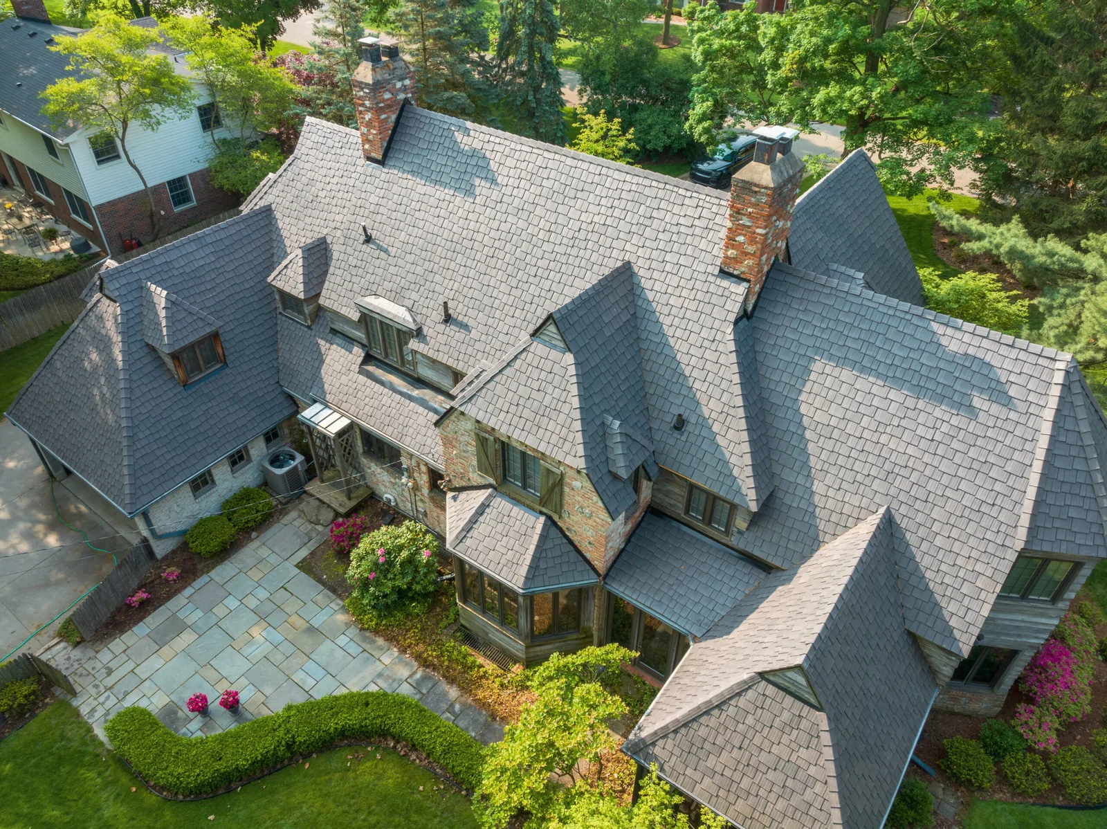 Aerial image of a historical home with a staggered Aged Cedar Enviroshake roof