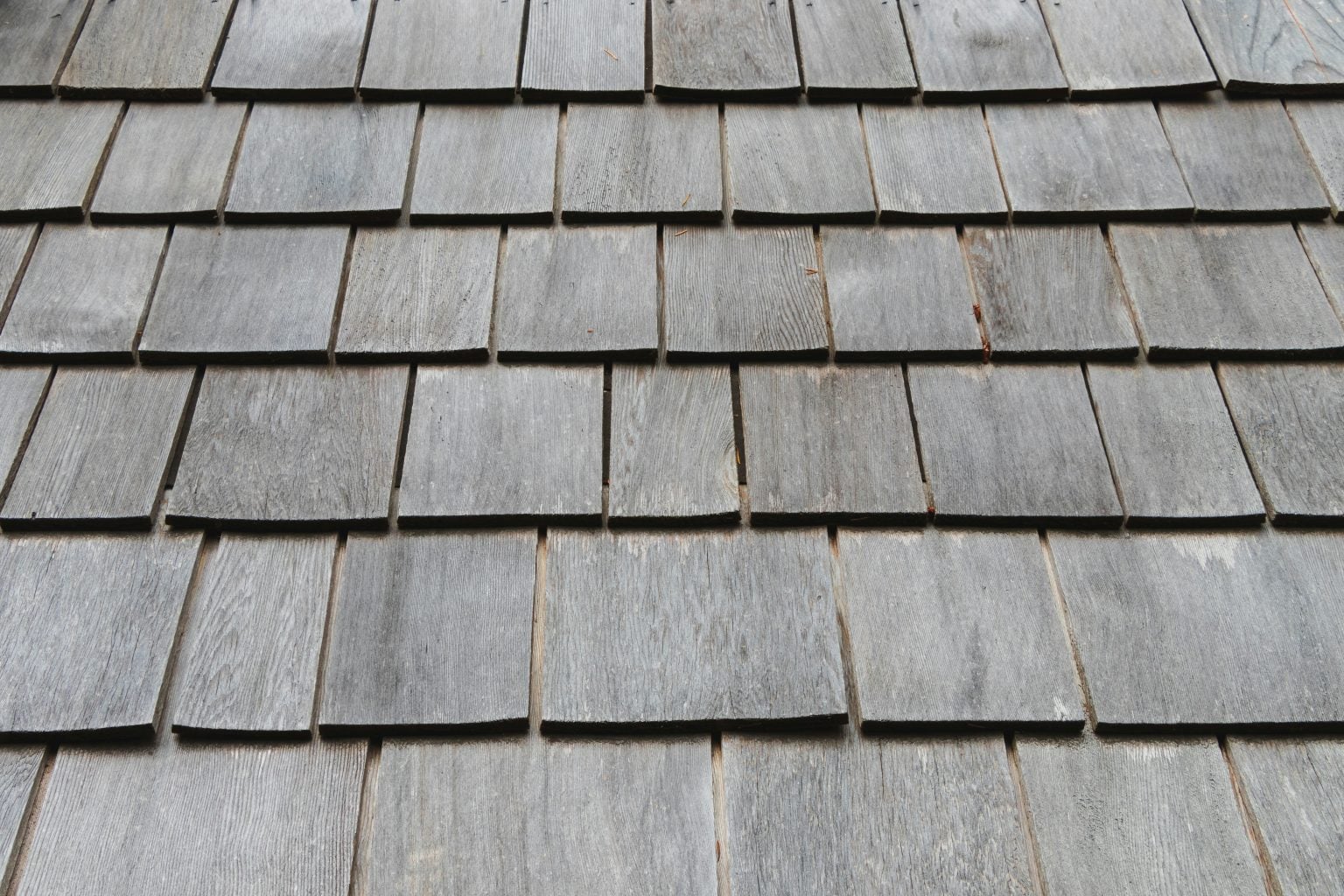 A natural cedar roof with an aged silver finish 