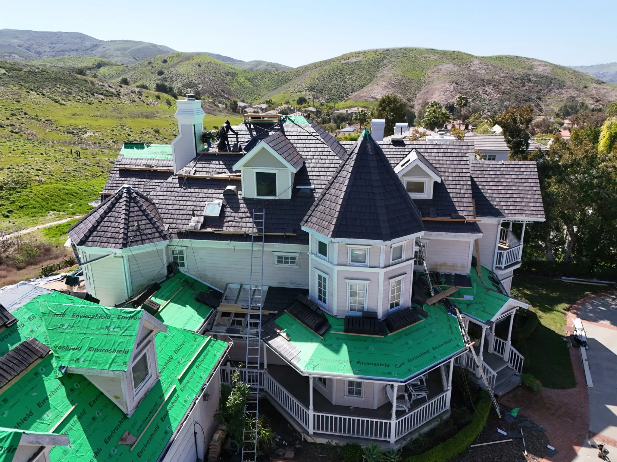 Aerial view of a Victorian home during Enviroshake roof installation