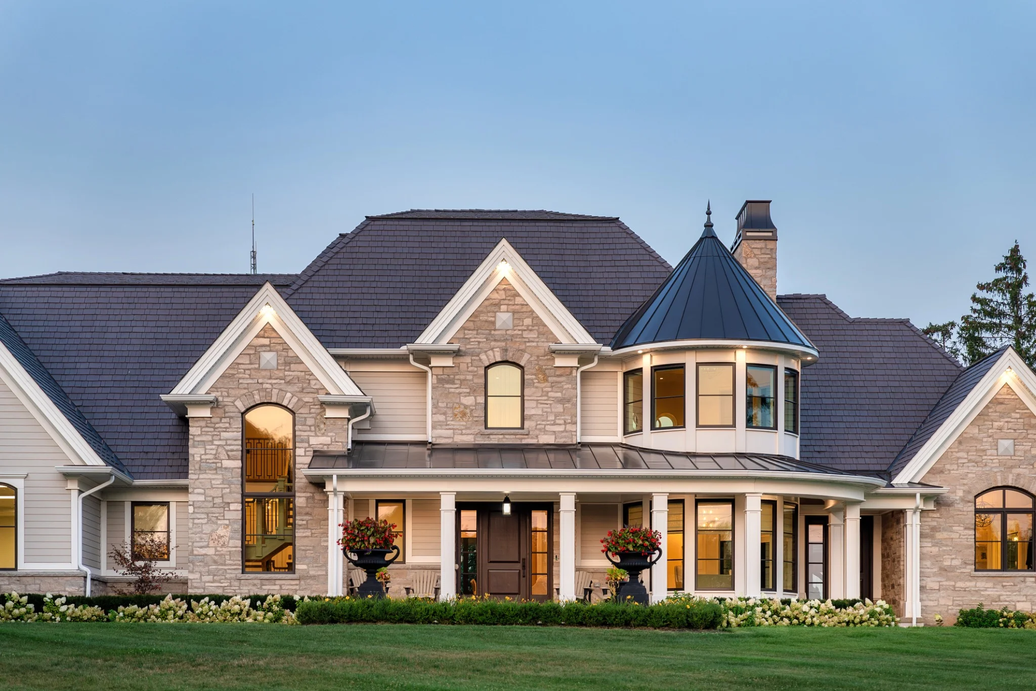 Stone and brick home with an Enviroshake roof in Niagara-on-the-Lake