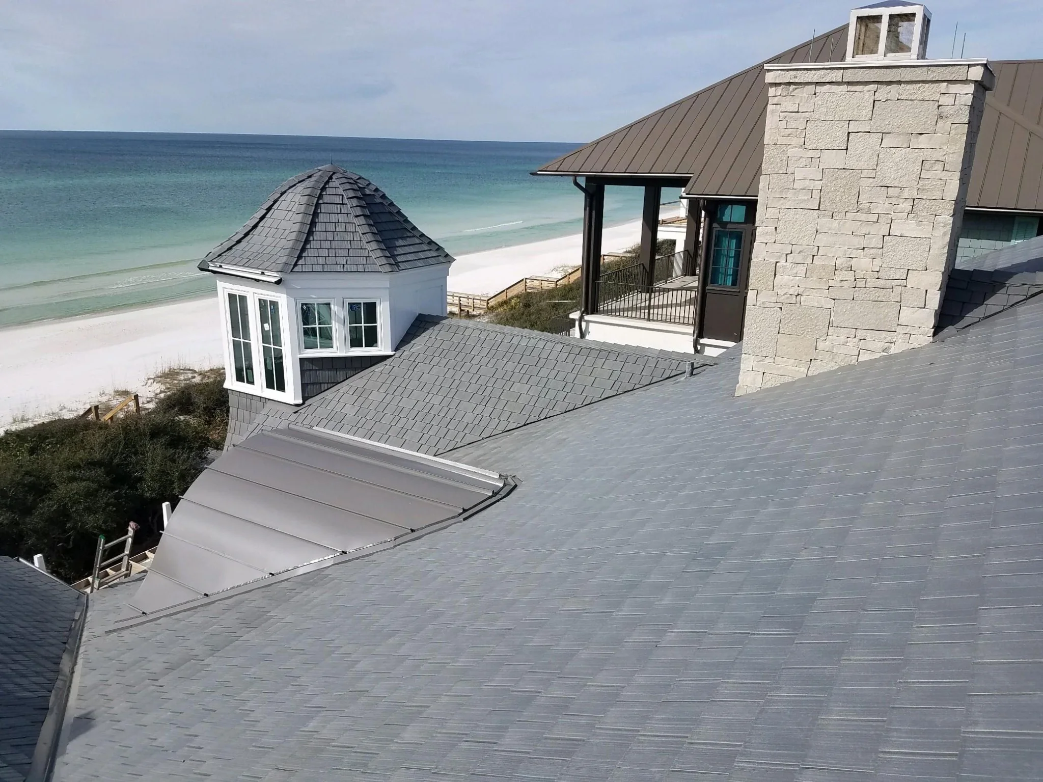 Coastal home with Enviroshake composite cedar roofing overlooking the ocean.