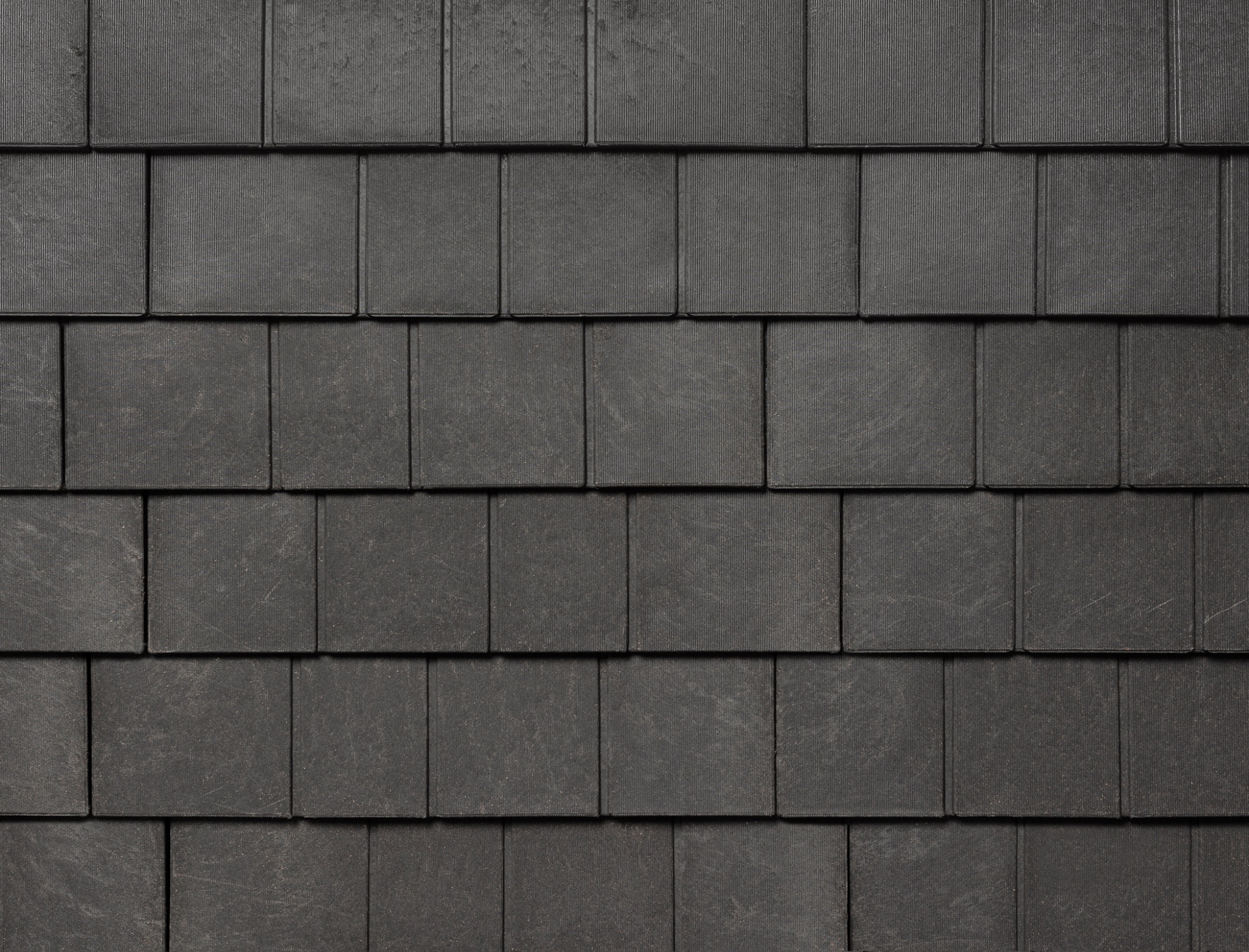Close-up swatch of Aged Cedar Enviroshingle, showcasing authentic perfection cedar shingle aesthetics and textural variation