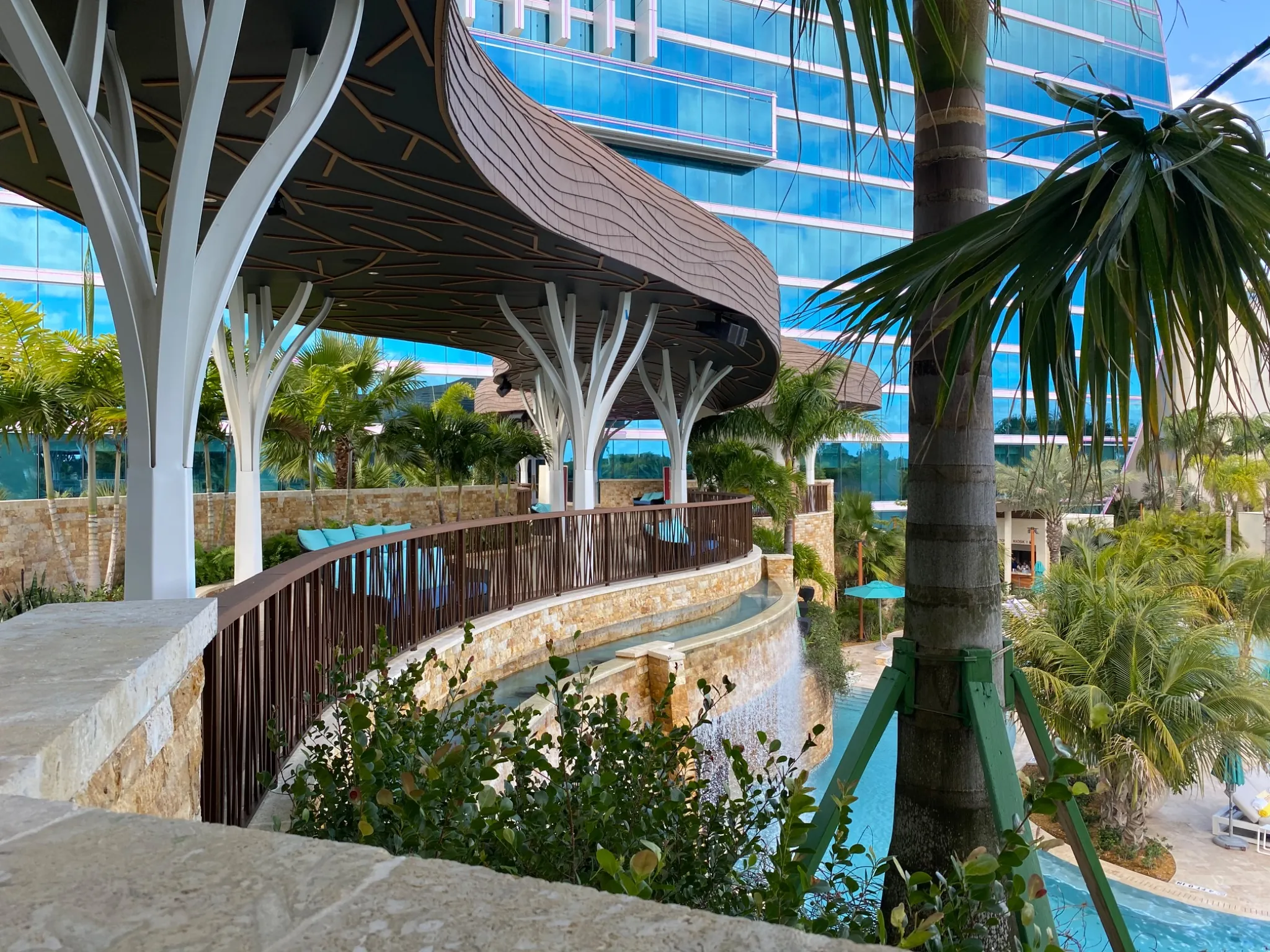 Seminole Hard Rock Hotel & Casino resort featuring Enviroshake roofing on the curved poolside structure.