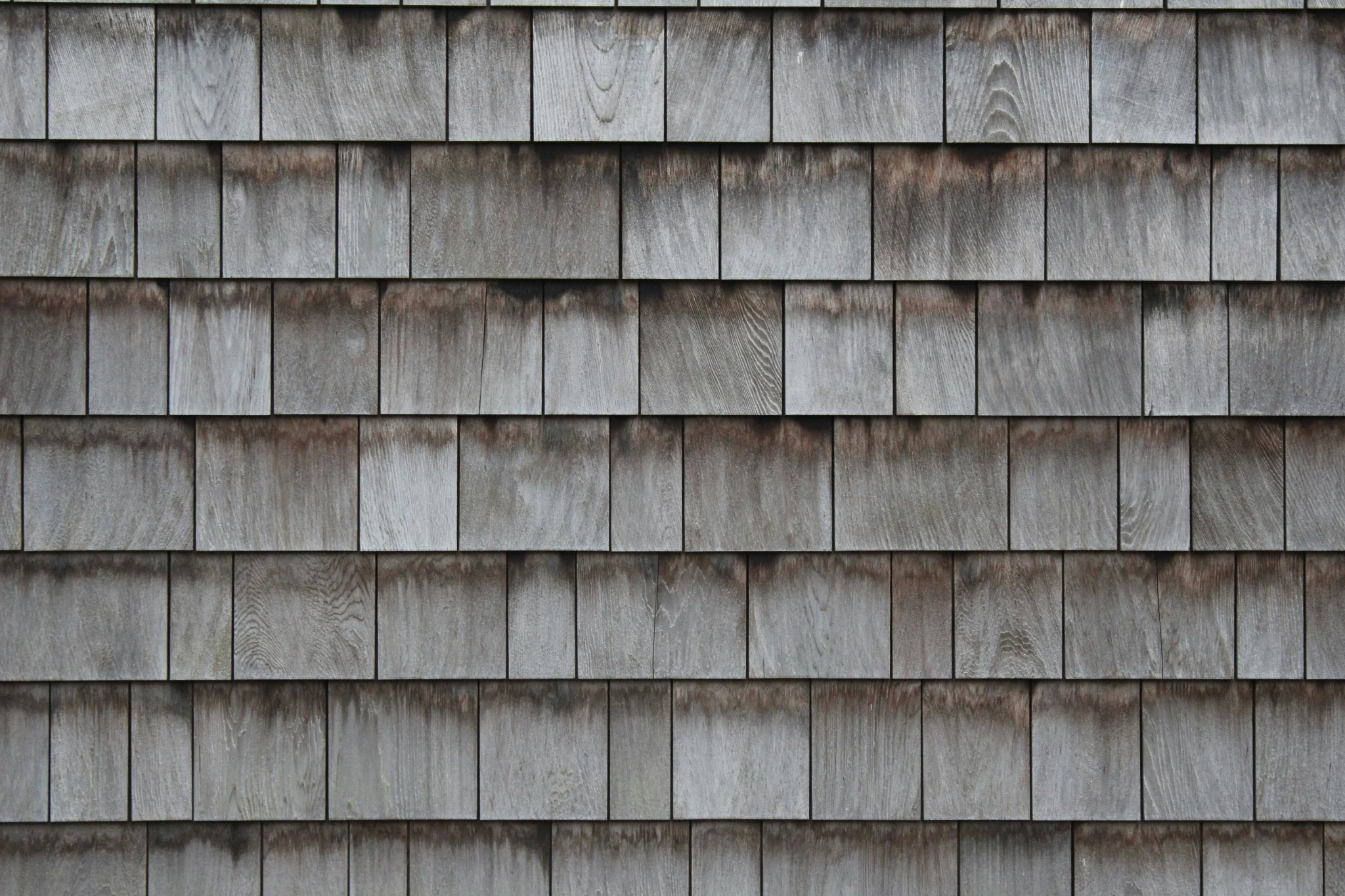 Close-up of weathered natural cedar shake shingles