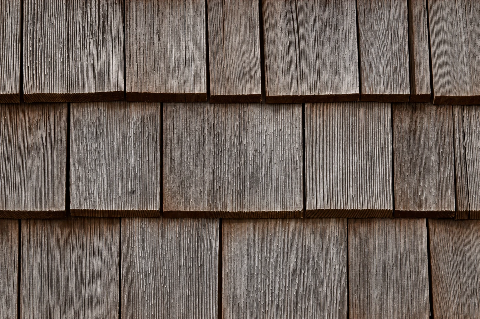 Natural cedar shakes weathering to a grey patina