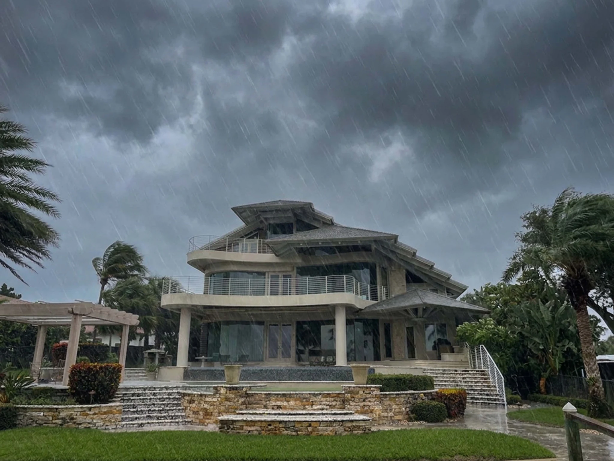 Aged Cedar Enviroshake composite cedar shake roof on a coastal home during heavy rain and high winds.