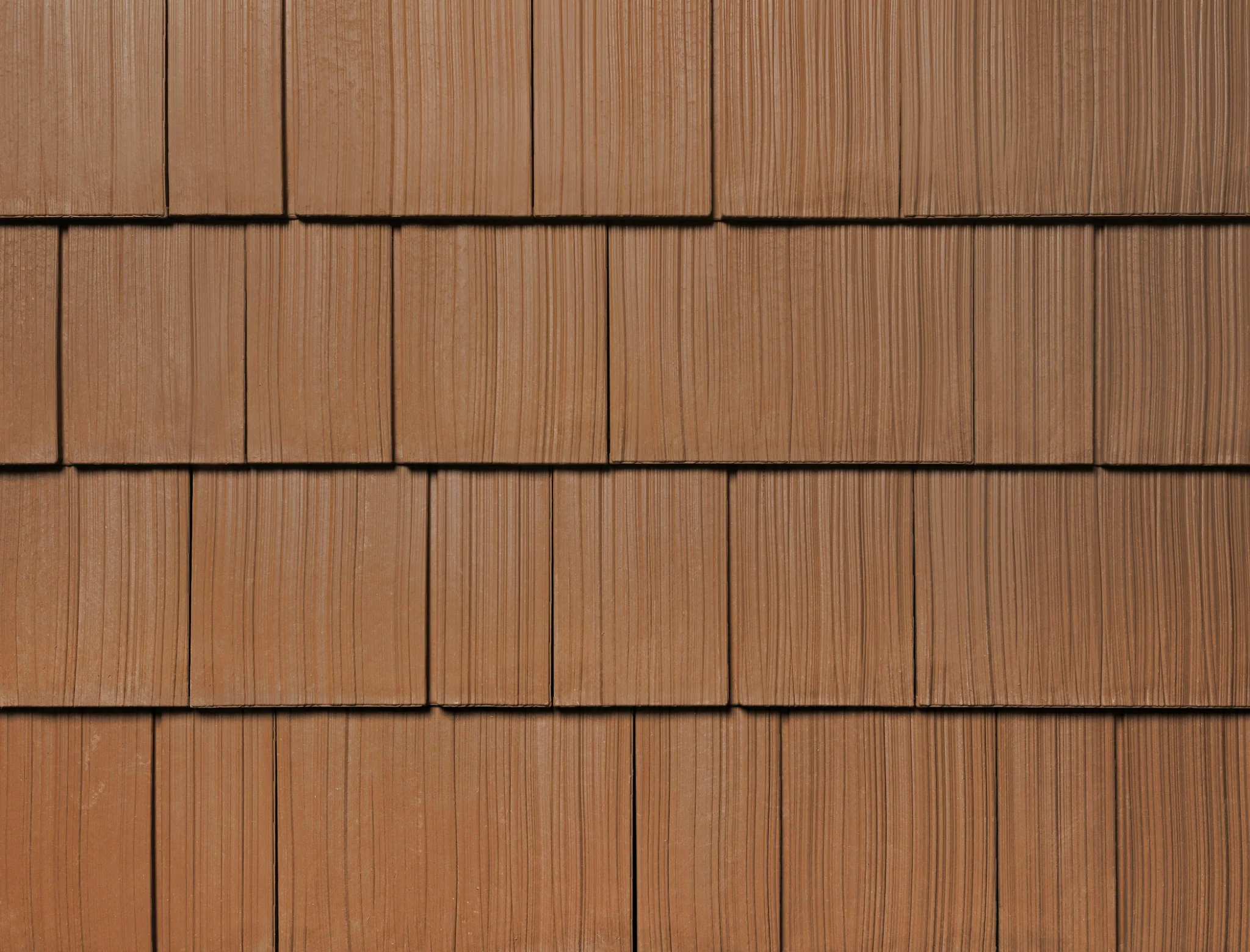 Terracotta shake colour sample showing wood-grain texture in staggered rows.
