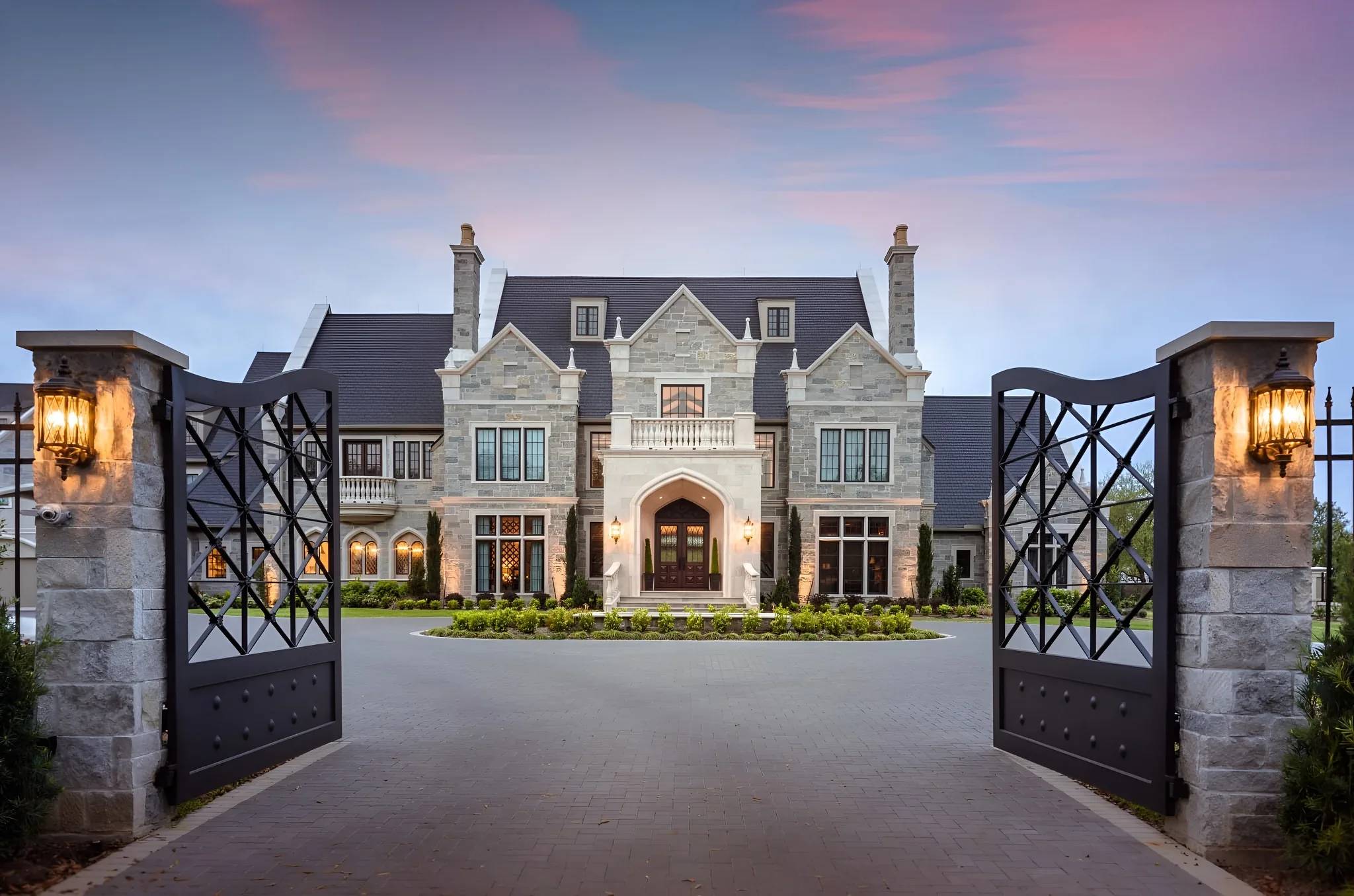 A grand gated tudor style estate with an Onyx Black Enviroslate synthetic roof