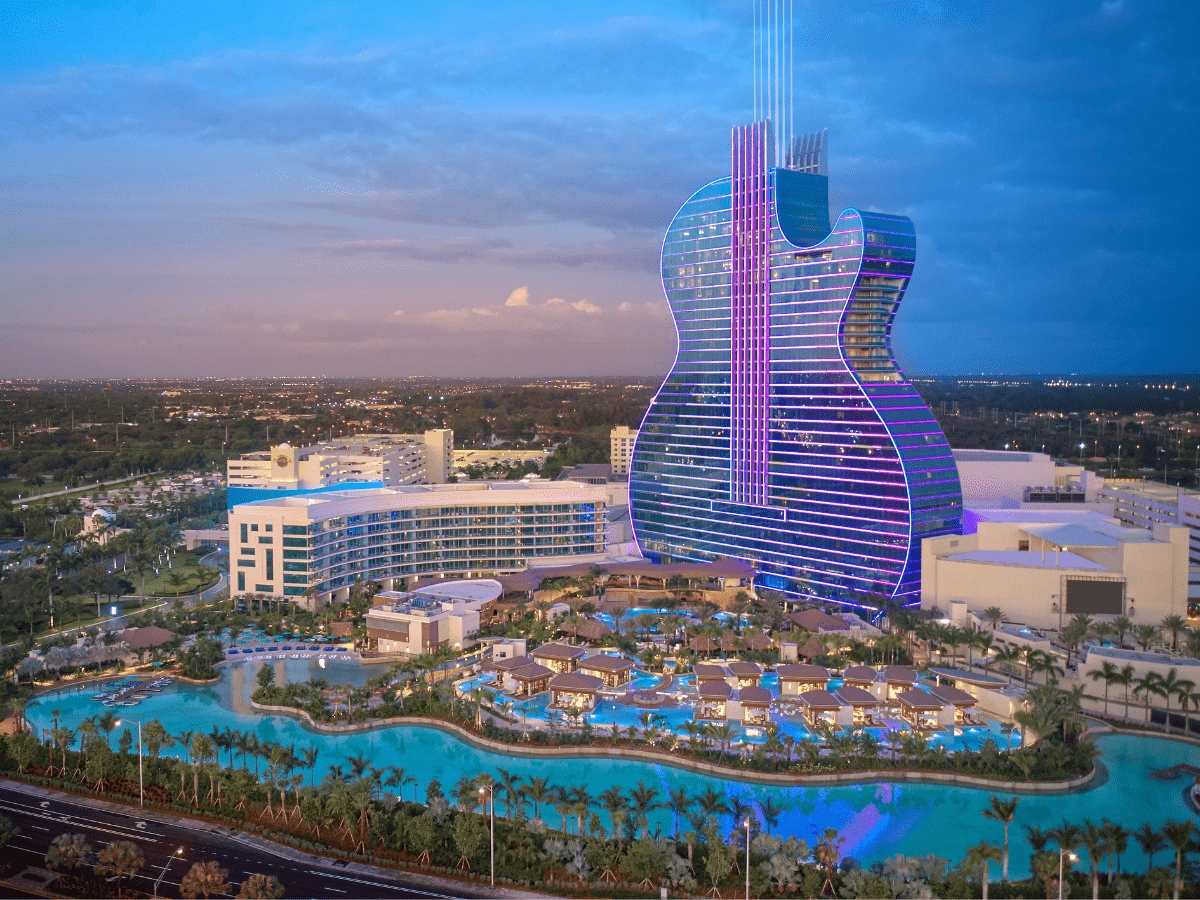 Seminole Hard Rock Hotel & Casino resort featuring the guitar-shaped hotel tower, pools and surrounding grounds.