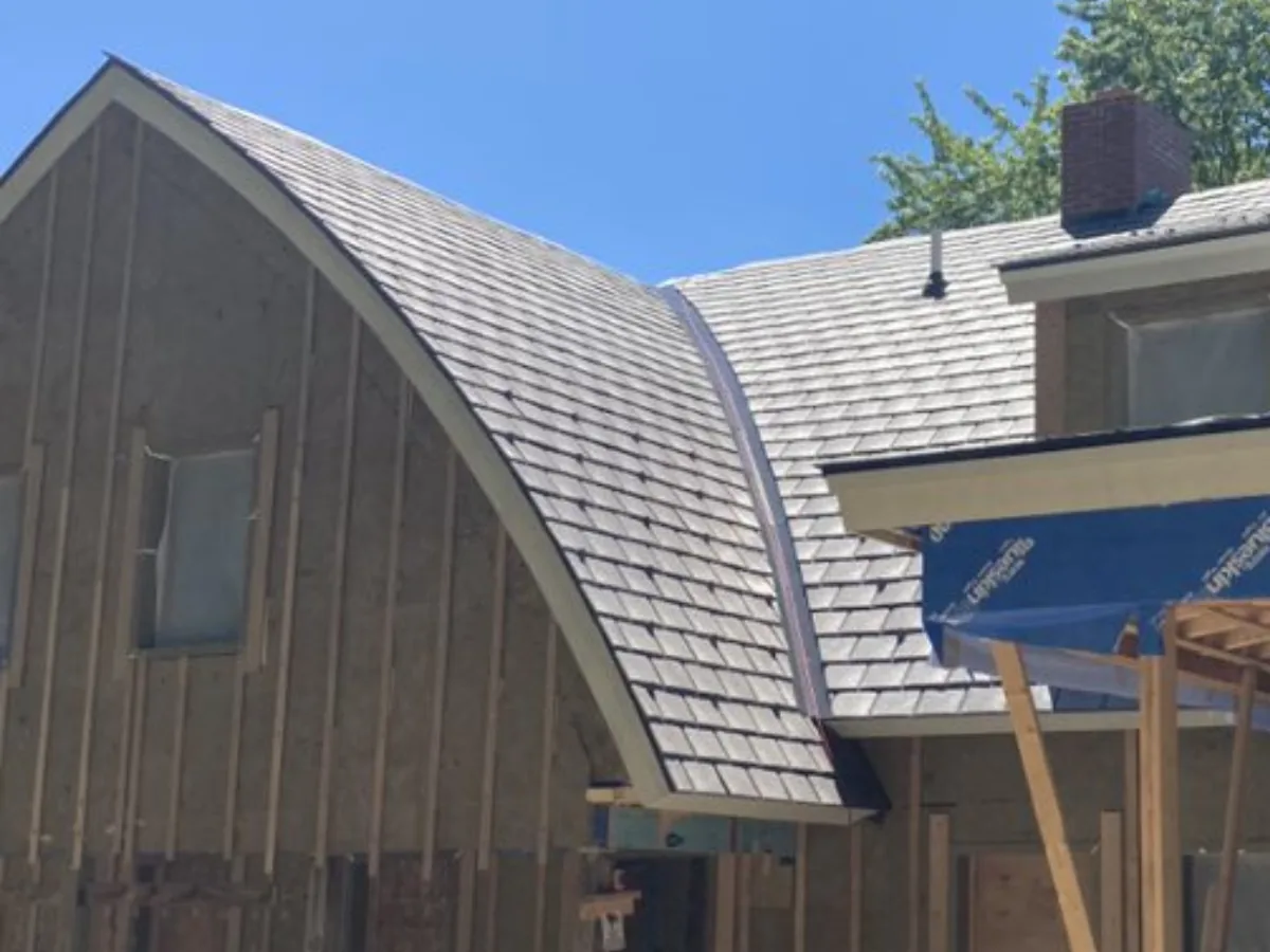 Enviroshake synthetic roofing installed on curved barn-style roof
