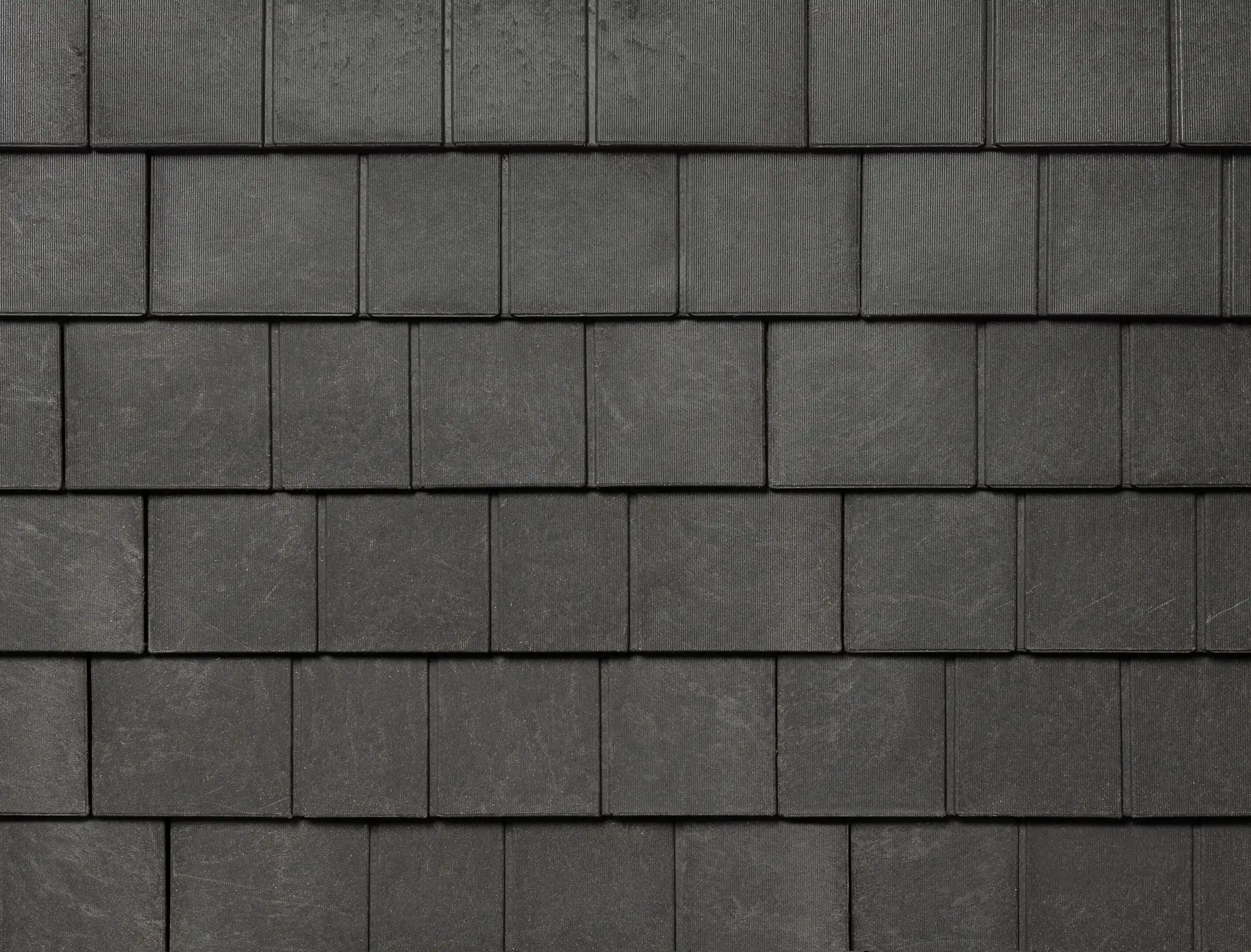 Close-up of Enviroshake Silvered Cedar synthetic shingles