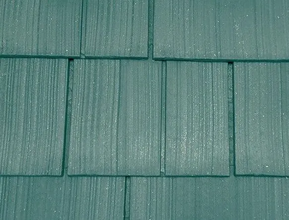 Blue shake colour sample showing wood-grain texture in staggered rows.