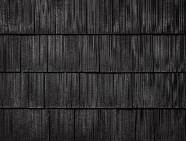 Onyx Black shake colour sample showing wood-grain texture in staggered rows.