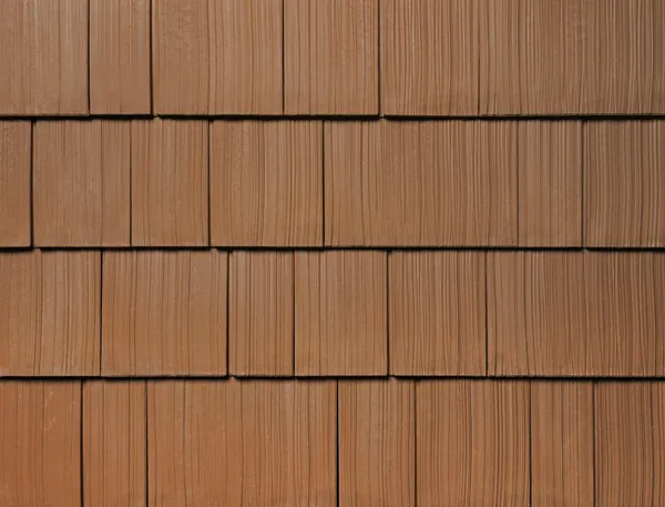 Terracotta shake colour sample showing wood-grain texture in staggered rows.