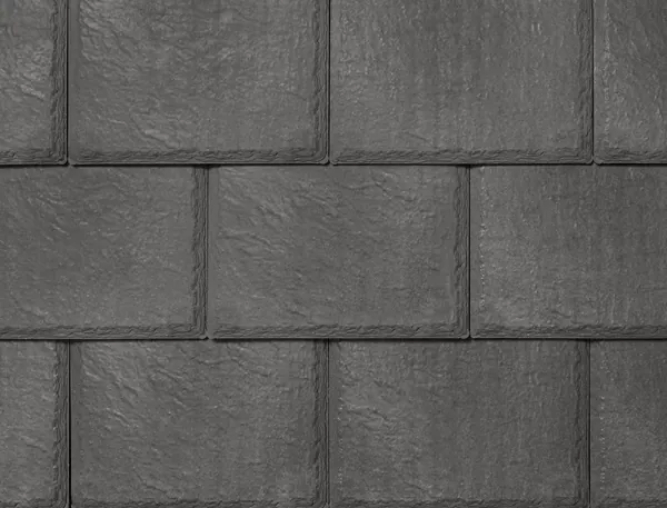 Close-up of Enviroslate tiles in Stone Grey