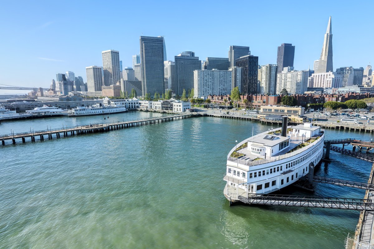 Aerial view of the Historic Klamath and its roof deck against the San Francisco skyline