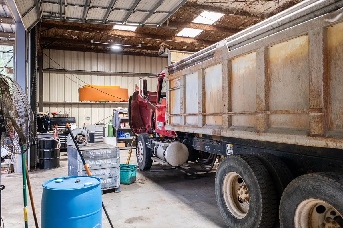 Diesel mechanic performing trailer repair services
