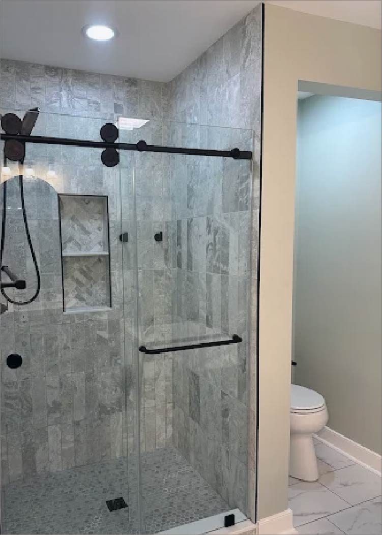 Kenny Contracting & Remodeling plumbing install, water repair, tile & floor install testimonial image.