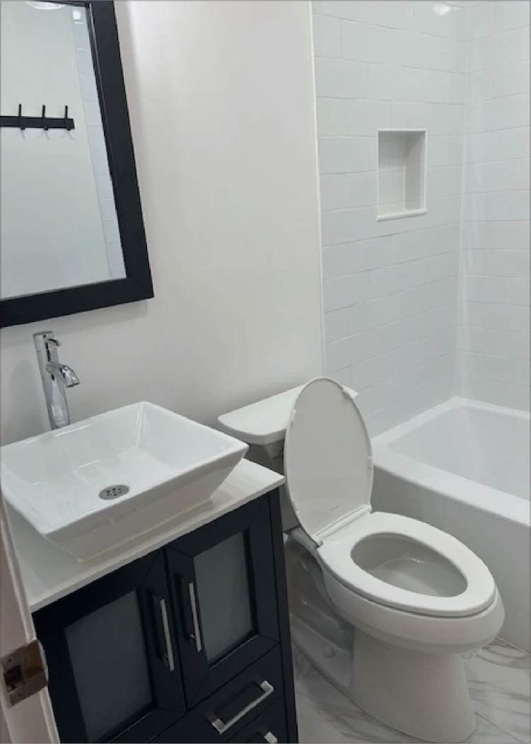 Kenny Contracting & Remodeling plumbing install, tile & floor install, fan install, & multiple room renovations testimonial image.