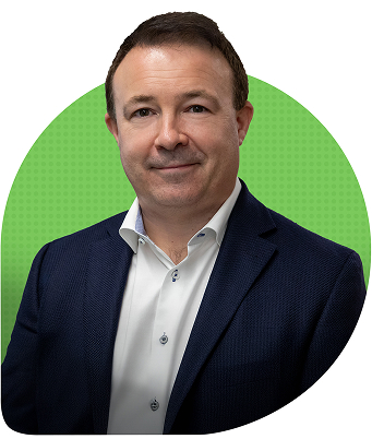 Headshot of Dr. Geoffrey Watson in front of a green circle background