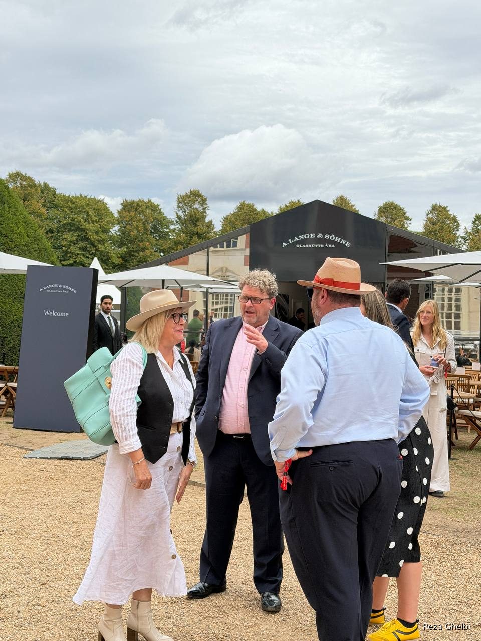 Guests talking outside the A. Lange and Söhne pavilion.