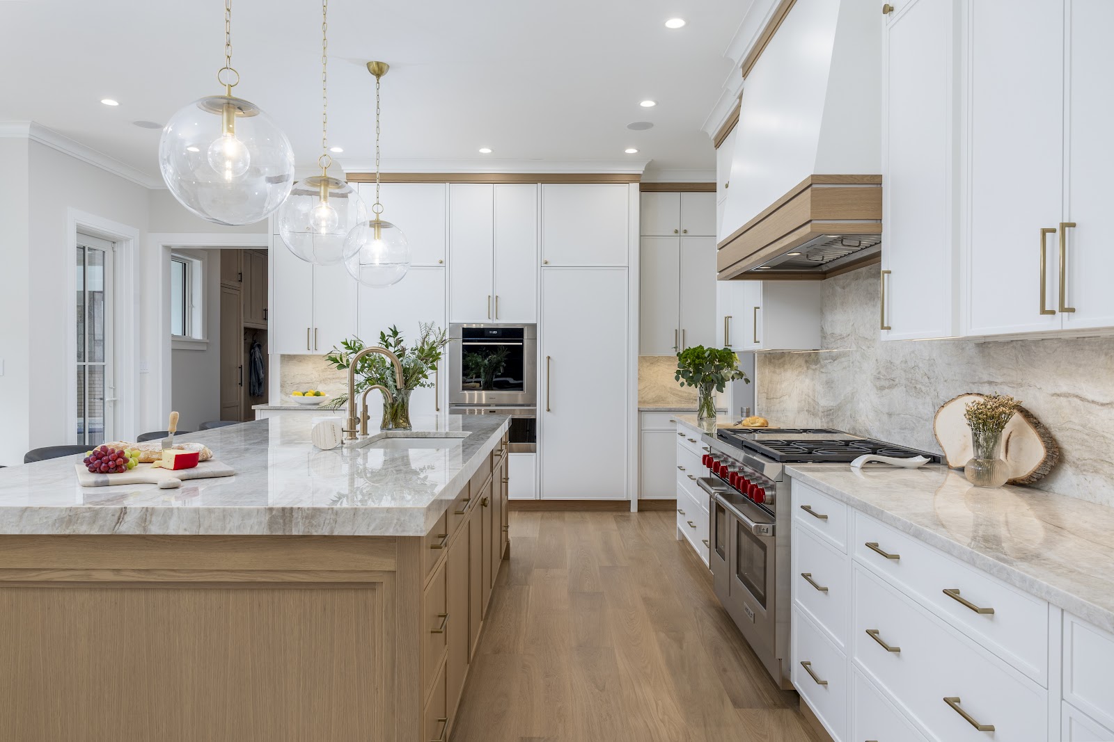 Lloyd Harbor new build kitchen with white oak island and Taj Mahal quartzite