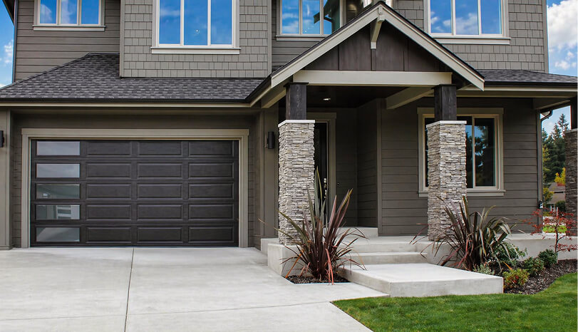 A completed garage door installation. The door is Hormann Clima Tech 4400 series.