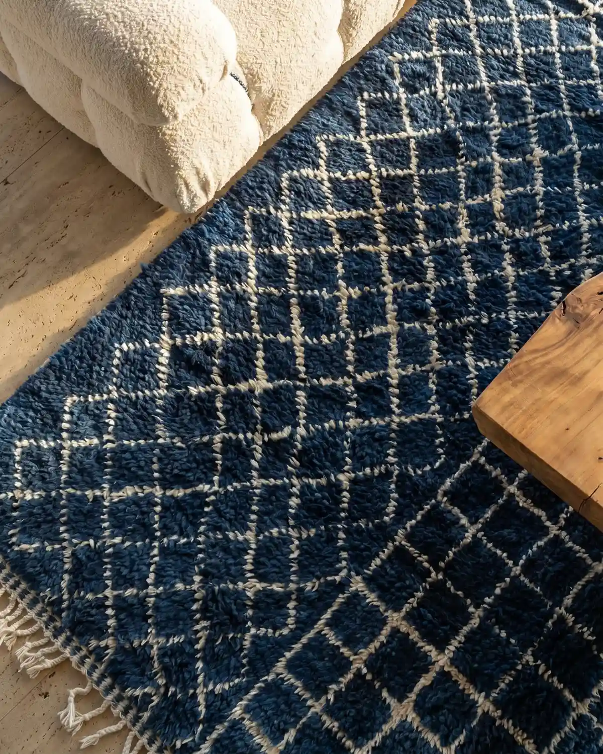 Azura blue Beni Ourain rug – overhead detail of ivory diamond grid pattern on deep navy wool with fringe