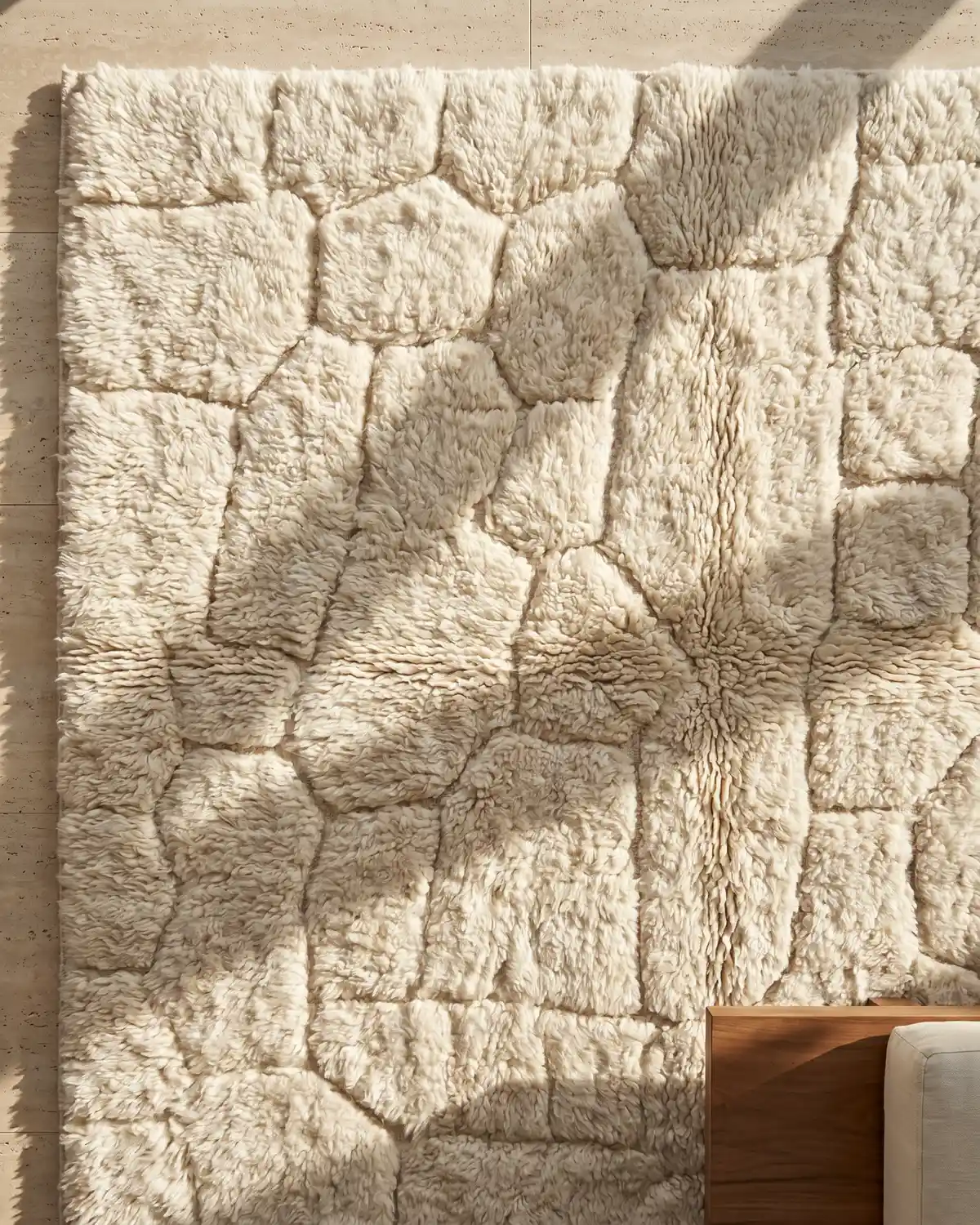 Nema white stone-pattern Moroccan rug – overhead detail of irregular raised blocks in dense natural wool with fringe